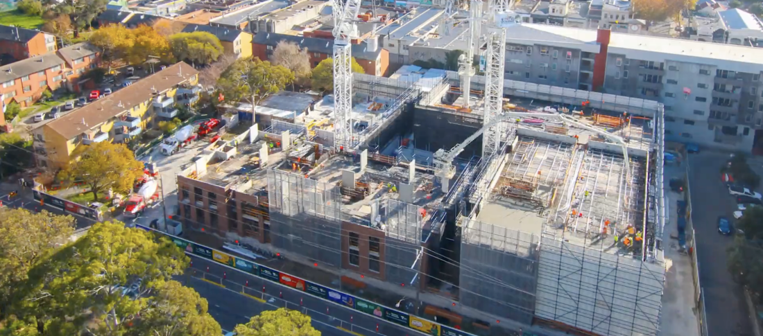 Aerial time-lapse still of Kane Construction’s Homes Victoria affordable housing project under construction